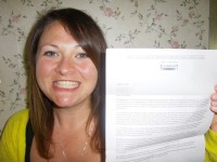 Student holding letter from Fulbright